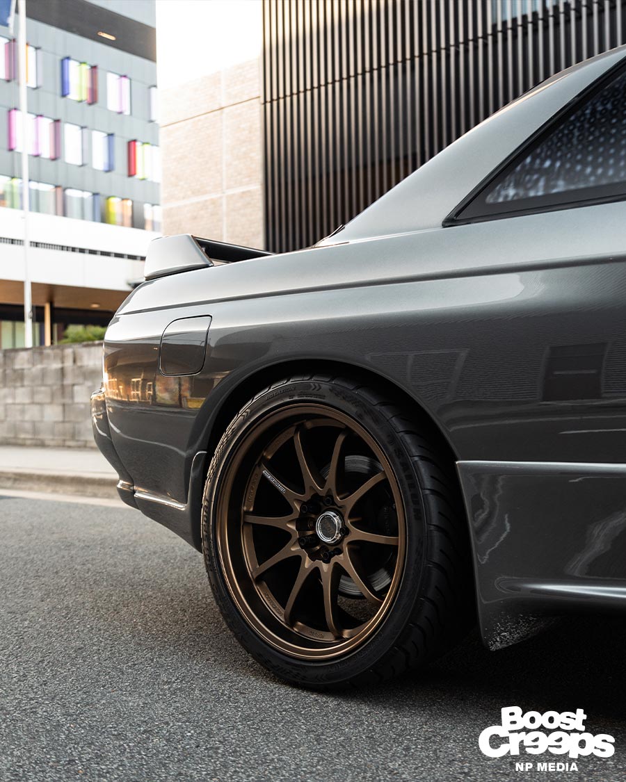 Clean Skyline R32 GTR in Slate Grey Metallic sitting on bronze Rays CE28 wheels in 18x9.5+15 with 265/35 tyres